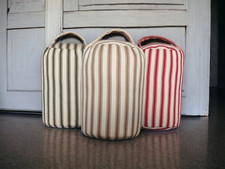 Fabric doorstop filled
