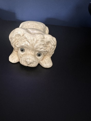Canadiana pottery laying beige - laying,