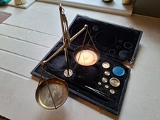 Vintage Brass Scales in box with weights and tweezers. Box has damaged corner.
