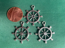 5 Ships Wheel Charms - antique