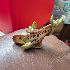 Tuskers A Christmas kiss Sign