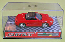 Cartrix Porsche Boxster soft-top in red. 1:32 slot car. Display and spares box!
