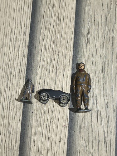 Monopoly car token 2 men - car,