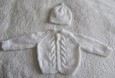 Hand knitted cable patterned
