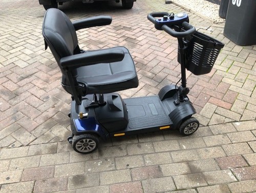 Blue mobility scooter barely - blue,