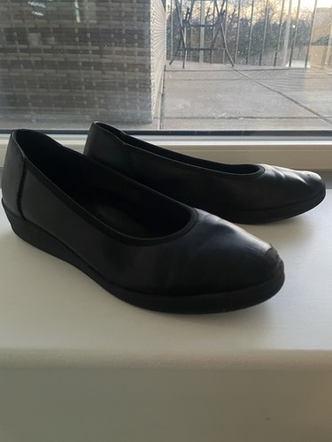 Very worn cabin crew shoe - worn,