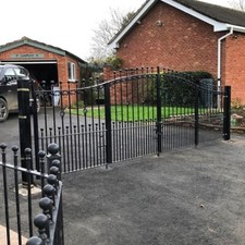 Bi folding curved top wrought