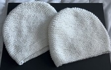 2 Hand knitted Baby Bonnets 
