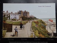 Child riding horse tricycle, Centre Cliff, SOUTHWOLD, Suffolk. Red Ensign