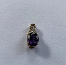 Rocks & Co 9ct yellow gold pendant. Blueberry quartz and diamond.