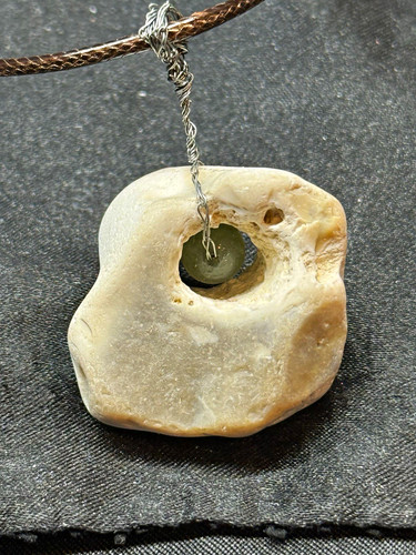 Hag stone necklace with green