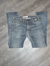 100 Levi’s 513 Distressed