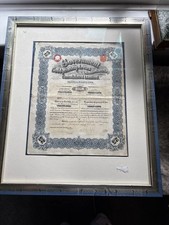 2 X SHARE CERTIFICATES FRAMED