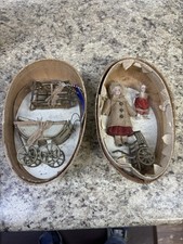Antique bisque dolls in wooden