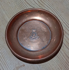 Copper ashtray impressed with