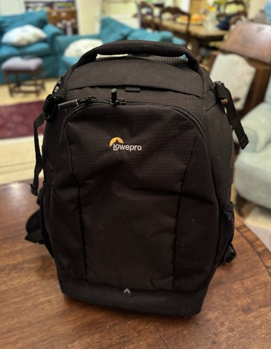 Lowepro camera and laptop - and,