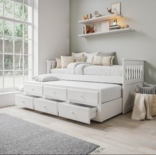 Single White Wooden Guest Bed