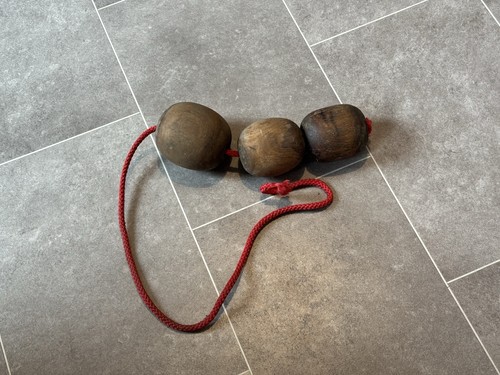 Old wooden balls a rope - 3,