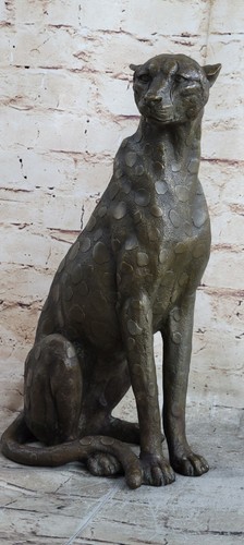 Bronze cheetah recliniing - cheetah,