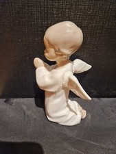 lladro, kneeling angel