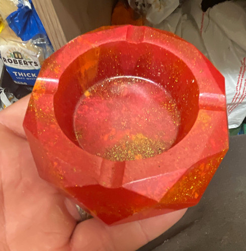 Red faceted resin ashtray with - resin,