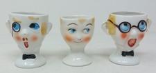 Three vintage 1930's Porcelain novelty Head Face Egg Cups