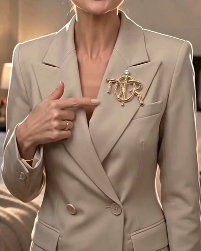 Gold tone metal letter - tone,