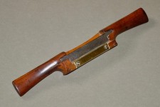 Old boxwood spokeshave with brass plate.