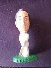 Corinthian Cricket Figure
