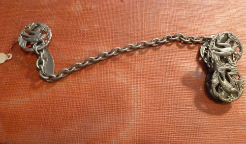 Elaborate silver metal