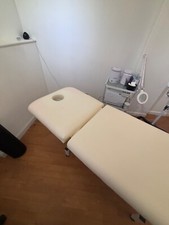 electic beauty bed, with remote. white, L1.8m X W73cm. adjustable head rest 