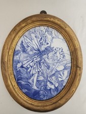 Oval Ceramic Fairy Plaque Blue and White in wooden frame 12"x10" 