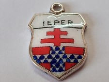 Silver travel shield charm
