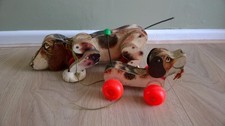 2 old vintage Fisher Price toy dogs looking for new home.