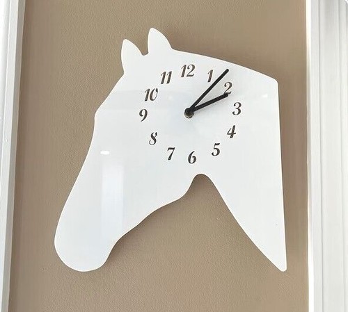 Horses head shaped clocks - head,