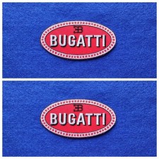 A Pair Of Motor Car Racing