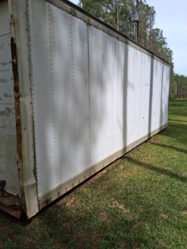 White metal shipping container - white,
