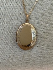 Unworn 9ct Oval Gold Locket