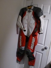 Prexport one piece vintage  motorcycle leathers with matching boots and gloves. 
