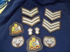 BRITISH ARMY CLOTH BADGES JOB LOT  WO2 RQMS NO2, RSM , STRIPES, GRENADE BADGE .