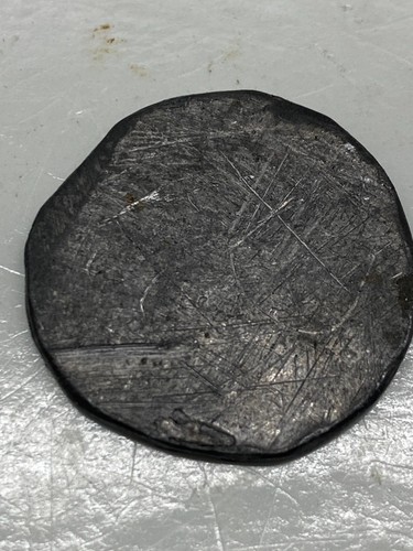 Possible hand struck old token - possible,