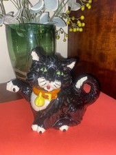 black cat teapot, which is a