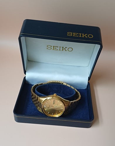 Seiko gold tone day date - tone,