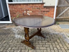 Ercol Dark Wood Oval Drop-Leaf  Dining Table