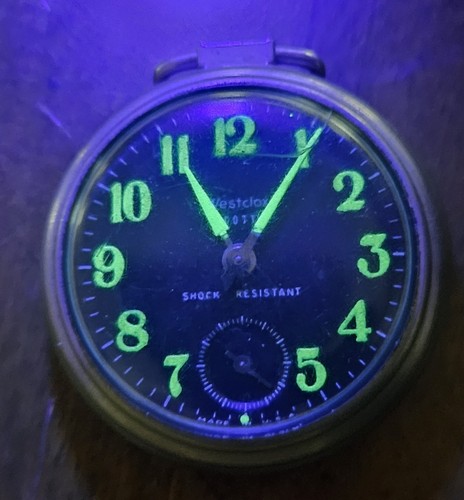 Glow under blacklight - blacklight, westclox