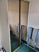 Built-In Wardrobe with Sliding Mirror Doors