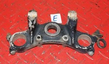 Triple clamp top fork upper