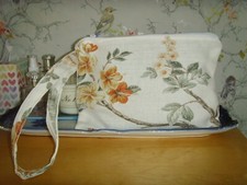 ZIP MAKE UP BOOK PURSE  LAURA