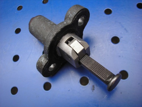 Timing chain tensioner rear - timing,