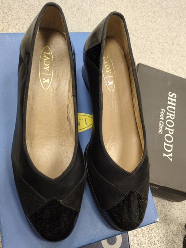 Lady black patent and - and, faux